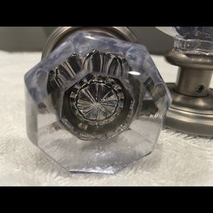 Chrystal dummy doorknobs.  Color is light lavender.